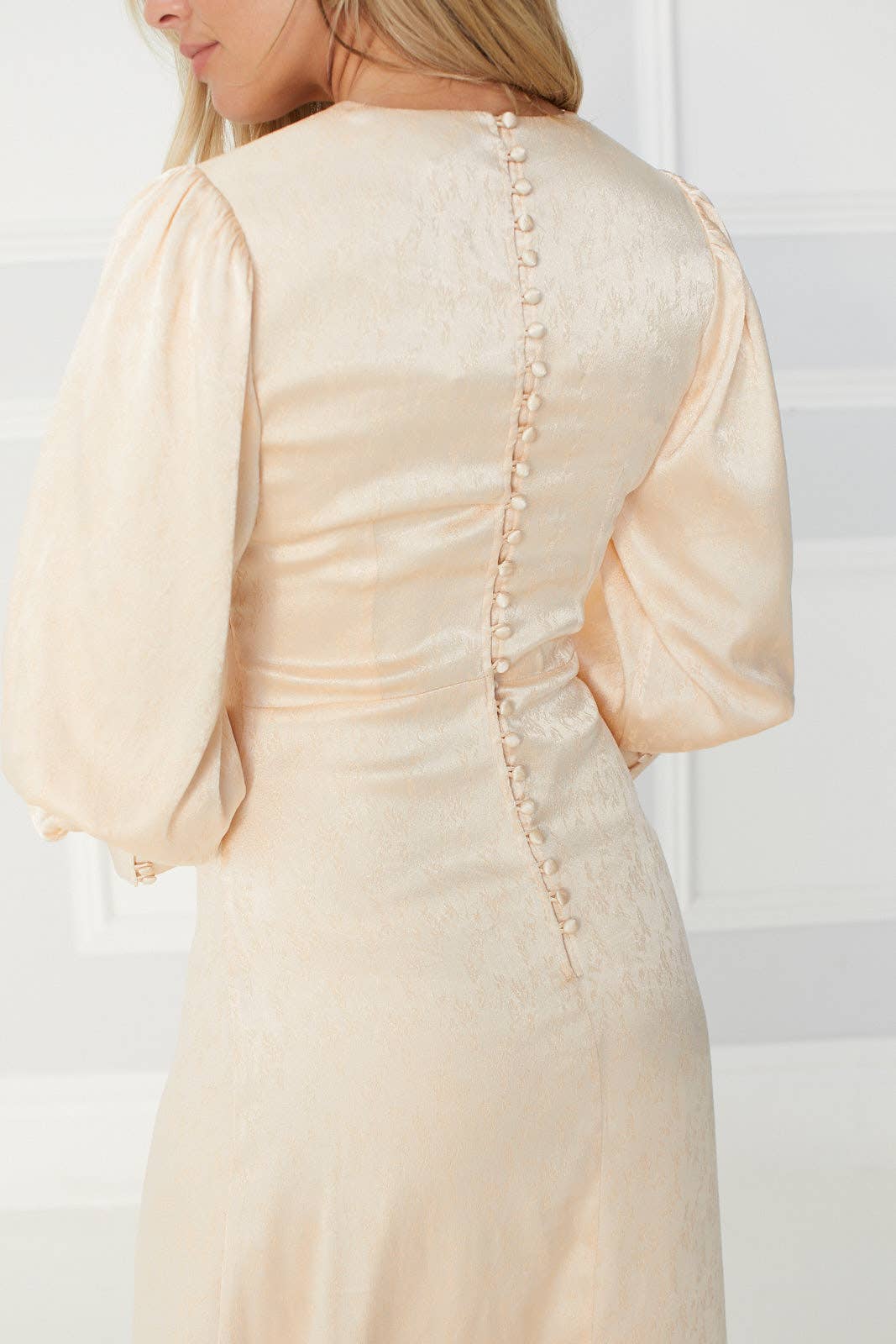 Tianna long gown in Pearl White with a Long Trail