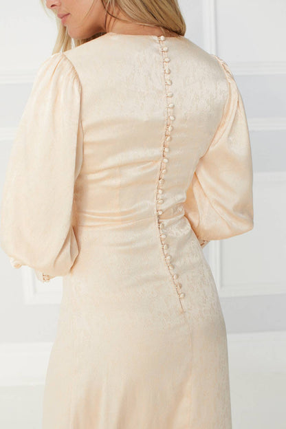 Tianna long gown in Pearl White with a Long Trail