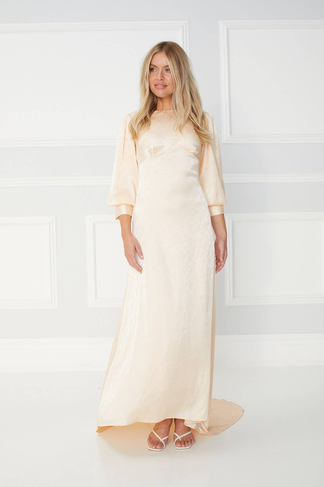 Tianna long gown in Pearl White with a Long Trail